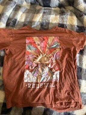 Renewal Graphic Tee in Rust with Colorful Sun Illustration